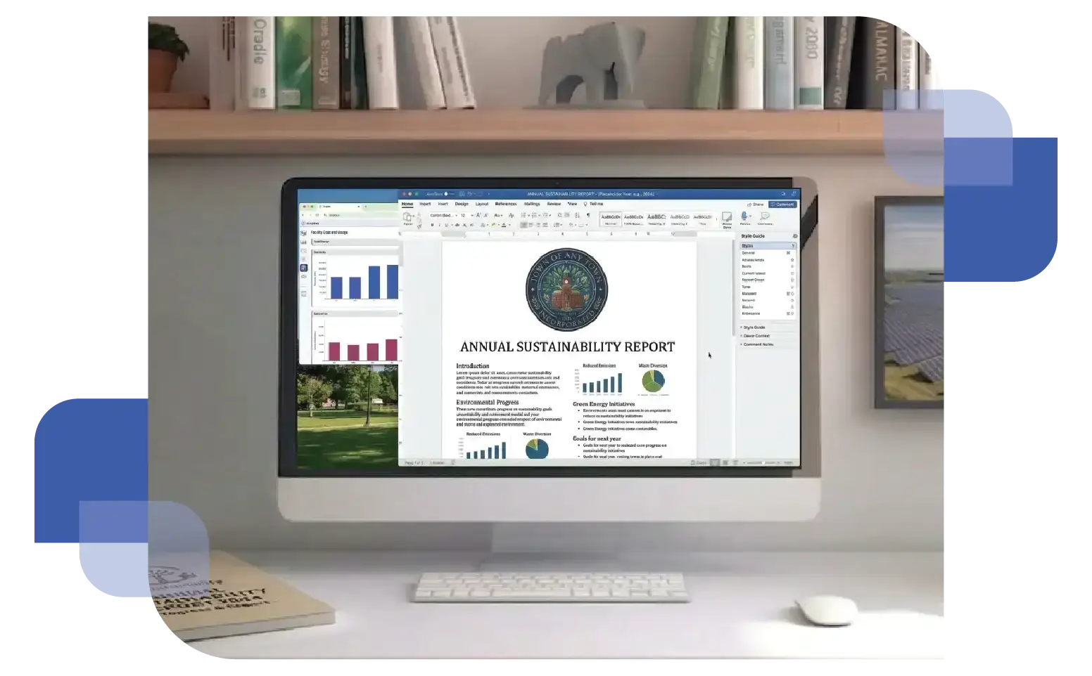 A workspace featuring a desktop computer showing the Enpira interface, which includes colorful bar graphs, pie charts, and data tables for tracking energy consumption and sustainability goals.